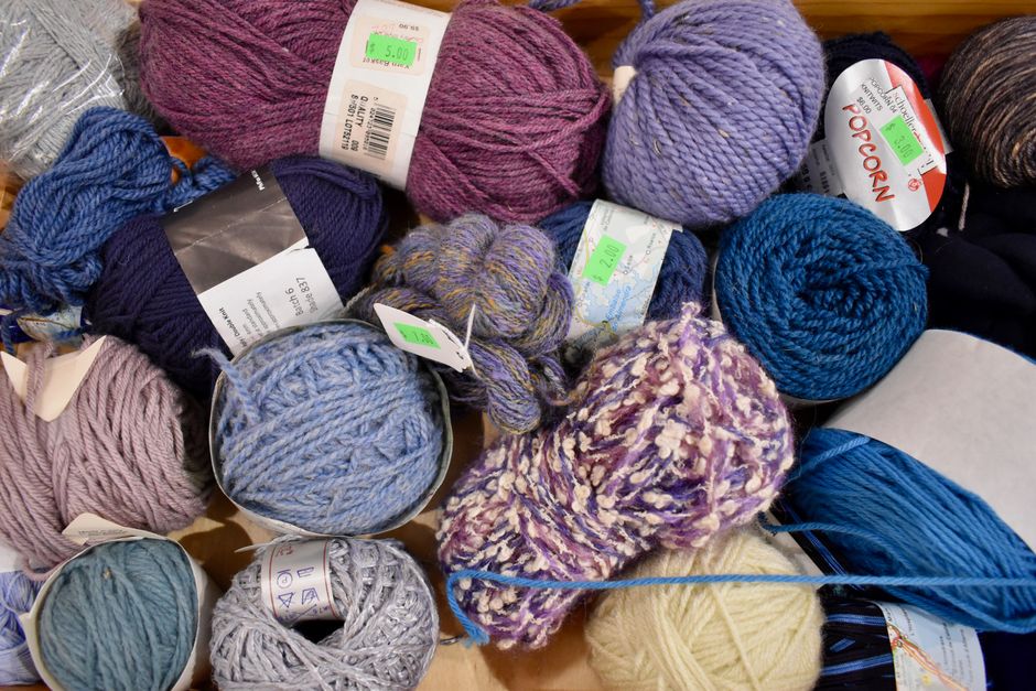 A collection of colorful yarn balls perfect for knitting, crochet, and DIY crafts.
