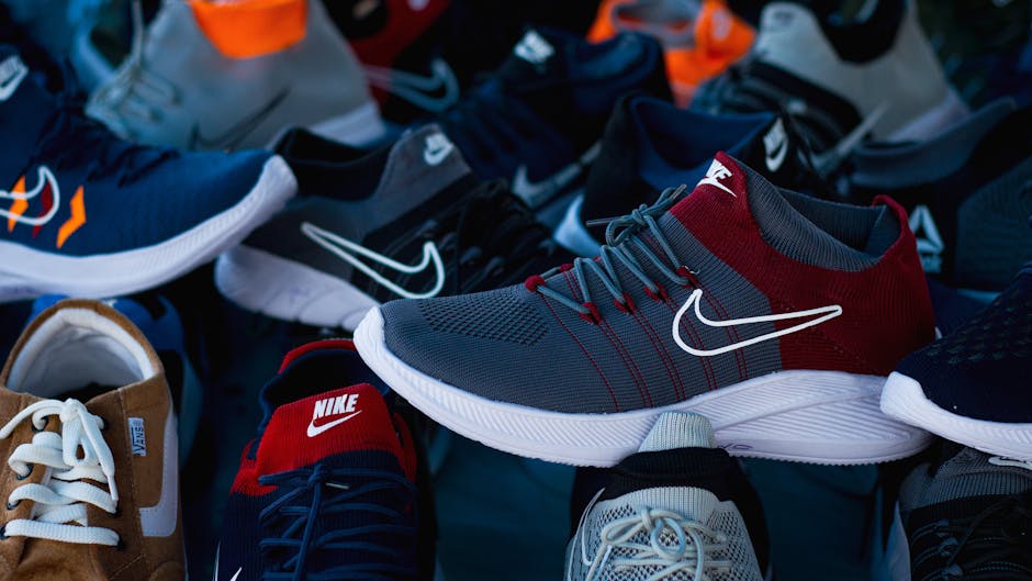 Diverse array of athletic shoes showcased in vibrant colors and various styles.